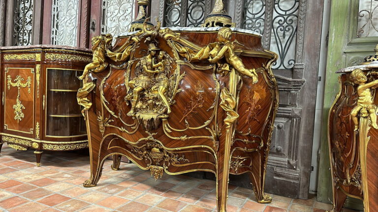 Bombé Commode with Gilt Figures